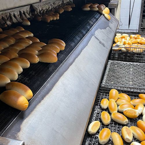 National Bakery rolls coming out of the oven